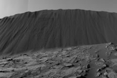 This view from NASA's Curiosity Mars Rover shows the downwind side of "Namib Dune," which stands about 13 feet (4 meters) high. The site is part of Bagnold Dunes, a band of dark sand dunes along the northwestern flank of Mars' Mount Sharp.

The component images stitched together into this scene were taken with Curiosity's Navigation Camera (Navcam) on Dec. 17, 2015, during the 1,196th Martian day, or sol, of the rover's work on Mars. (NASA/JPL-Caltech)