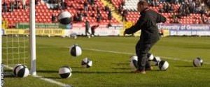 Beach balls are thrown onto the pitch before Charlton's game with Middlesbrough