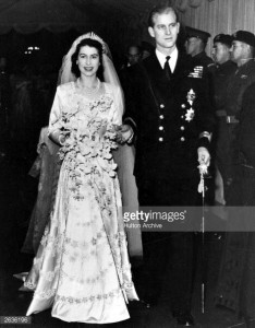 Queen Elizabeth II, as Princess Elizabeth, and her husband the Duke of Edinburgh, styled Prince Philip in 1957, on their wedding day. She became queen on her father King George VI's death in 1952. (Photo by Hulton Archive/Getty Images)